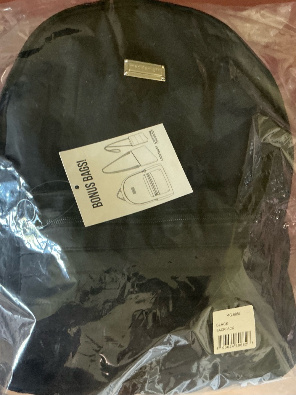 Madden Girl Black Backpack with Gold Logo Plate